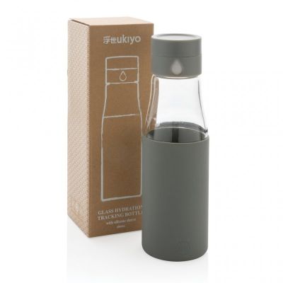 Ukiyo glass hydration tracking bottle with sleeve